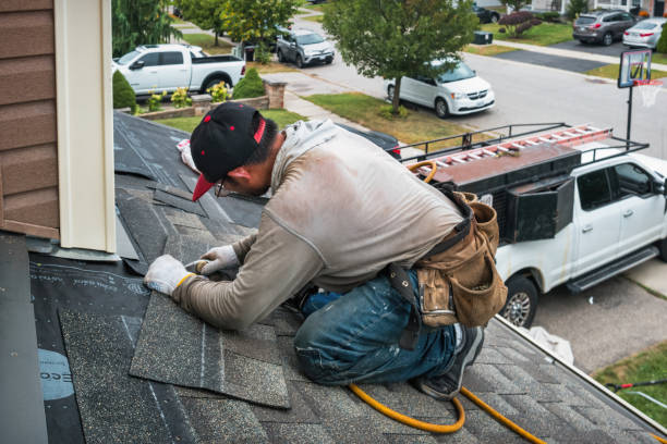 Professional Roofing technician working in Iron Station, NC